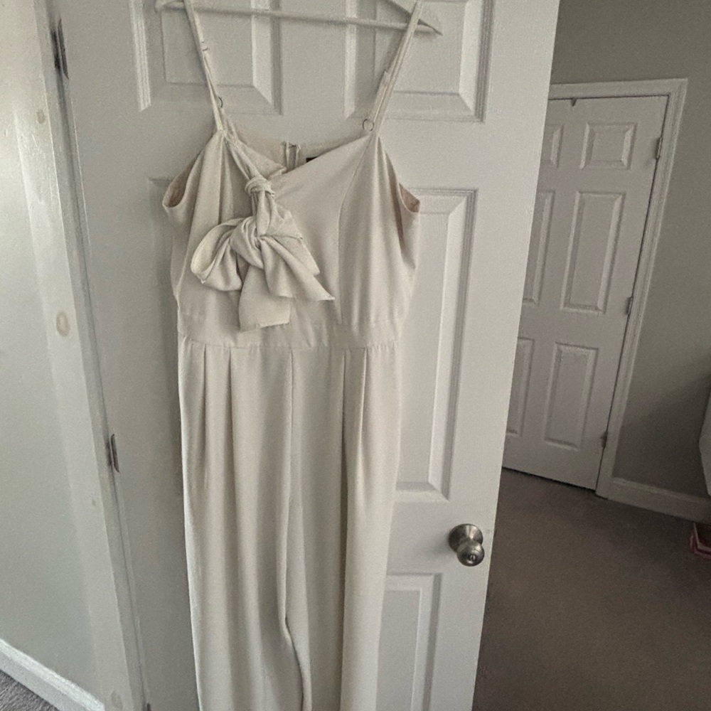 Eloquii Elegant Cream Jumpsuit with Bow Detail